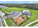 Overhead view of community amenities including a playground, parking, and a dog park at 35530 Shade Fern Ln, Zephyrhills, FL 33541