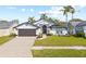 Charming single-Gathering home boasting a well-manicured lawn and mature trees at 3817 105Th N Ave, Clearwater, FL 33762