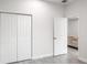 Spacious bedroom featuring a closet and doorway leading into the living room at 4104 E Comanche Ave, Tampa, FL 33610