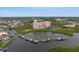 Overhead shot of waterfront condo building with docks and boat slips providing convenient water access at 4516 Seagull Dr # 614, New Port Richey, FL 34652