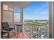 Balcony with seating and serene water views at 4516 Seagull Dr # 614, New Port Richey, FL 34652
