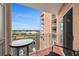 Balcony view overlooking parking area and waterfront scenery at 4516 Seagull Dr # 614, New Port Richey, FL 34652