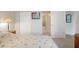 Inviting bedroom featuring closet and bathroom access at 4516 Seagull Dr # 614, New Port Richey, FL 34652