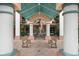 Inviting building entrance with seating and landscaping at 4516 Seagull Dr # 614, New Port Richey, FL 34652