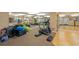Bright gym with fitness equipment and mirrored wall at 4516 Seagull Dr # 614, New Port Richey, FL 34652