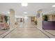 Spacious lobby area with neutral tones, tile flooring, and comfortable seating at 4516 Seagull Dr # 614, New Port Richey, FL 34652