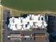 Rooftop view of the condominium showing parking, A/C units and access to Tampa Bay at 500 Treasure Island Cswy # 402, Treasure Island, FL 33706