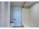 Clean, well-lit bathroom showcasing toilet and bath/shower combination at 500 Treasure Island Cswy # 402, Treasure Island, FL 33706