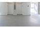 Two white elevators in a brightly lit hall are ready to transport residents and guests within the building at 500 Treasure Island Cswy # 402, Treasure Island, FL 33706