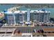 Multi-story condo building with bay views, ample parking, and well-maintained landscaping at 500 Treasure Island Cswy # 402, Treasure Island, FL 33706