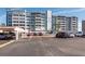 The condo building is visible from the parking lot at 500 Treasure Island Cswy # 402, Treasure Island, FL 33706
