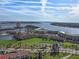 Breathtaking aerial view showcasing the coastal community, golf course, and stunning waterfront scenery at 6021 Bahia Del Mar Cir # 234, St Petersburg, FL 33715