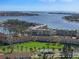 Birds-eye view of the waterfront condos, showcasing the manicured green spaces and waterfront location at 6021 Bahia Del Mar Cir # 234, St Petersburg, FL 33715