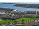 High-angle view of a waterfront community with manicured landscaping and sparkling water features at 6021 Bahia Del Mar Cir # 234, St Petersburg, FL 33715