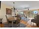 Inviting living room featuring a dining area, hardwood floors, and panoramic views of the coastline at 6021 Bahia Del Mar Cir # 234, St Petersburg, FL 33715