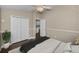 Cozy bedroom featuring a ceiling fan, closet with a view into the home at 632 Addison Ne Dr, St Petersburg, FL 33716