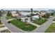 Desirable waterfront neighborhood showcasing lush lawns and mature palms with quick access to the open bay at 8000 13Th S Ave, St Petersburg, FL 33707