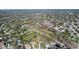 An expansive aerial view of the neighborhood showcasing the residential area with tree-lined streets and green spaces at 808 Smith Bay Dr, Brandon, FL 33510