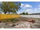 Backyard with both wood and vinyl fencing and an area with brick at 8930 94Th Ave, Seminole, FL 33777