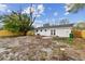 Backyard view of exterior and brick paver patio and a newly installed wooden fence at 8930 94Th Ave, Seminole, FL 33777
