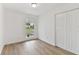Bedroom view shows closet and a window at 8930 94Th Ave, Seminole, FL 33777