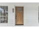 Close up of front door and address plaque at 8930 94Th Ave, Seminole, FL 33777