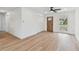 Open living area with wood floors, fresh paint and natural light at 8930 94Th Ave, Seminole, FL 33777