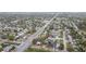 Overview of a neighborhood with well-maintained streets, mature trees, and easy access to local amenities and major roads at 8930 94Th Ave, Seminole, FL 33777