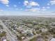 A sprawling neighborhood with a mix of residential areas, lush greenery, and glimpses of a serene lake at 8930 94Th Ave, Seminole, FL 33777