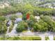 Beautiful home nestled among lush greenery and a serene pond, offering privacy and natural beauty at 9811 Memorial Hwy, Tampa, FL 33615