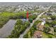 Charming neighborhood with serene pond, surrounded by lush greenery, offering tranquil living environment at 9811 Memorial Hwy, Tampa, FL 33615
