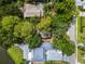 Aerial view of neighborhood with mature trees at 9811 Memorial Hwy, Tampa, FL 33615