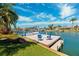 Beautiful waterfront property featuring a private dock with seating and stunning water views at 123 12Th E St, Tierra Verde, FL 33715