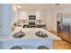 Bright and modern kitchen with quartz countertops, breakfast bar, and stainless steel appliances at 1364 S Evergreen Ave, Clearwater, FL 33756