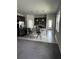 Bright, open-concept kitchen with a central island, pendant lighting, and stainless steel appliances at 1556 N River Cir, Tarpon Springs, FL 34689