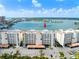 Stunning aerial view of the condo complex showcasing its prime waterfront location and convenient parking at 17735 Gulf Blvd # 204, Redington Shores, FL 33708