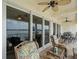 Balcony showing outdoor seating with sliding doors, blending indoor and outdoor living spaces at 17735 Gulf Blvd # 204, Redington Shores, FL 33708
