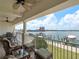 Balcony showcasing outdoor seating with marina views, perfect for enjoying waterfront living at 17735 Gulf Blvd # 204, Redington Shores, FL 33708