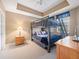 Bedroom with a bunk bed setup, complemented by wooden furniture and nautical-themed decor at 17735 Gulf Blvd # 204, Redington Shores, FL 33708