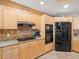 This kitchen is equipped with stainless steel appliances, granite counters and beautiful custom cabinets at 17735 Gulf Blvd # 204, Redington Shores, FL 33708