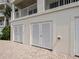 Convenient ground-level storage units with louvered doors, providing ample space for outdoor equipment and belongings at 17735 Gulf Blvd # 204, Redington Shores, FL 33708