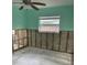 Bedroom with a window and light blue walls at 1774 Michigan Ne Ave, St Petersburg, FL 33703