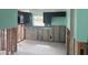 Kitchen featuring dark cabinets, a window, and space for appliances at 1774 Michigan Ne Ave, St Petersburg, FL 33703