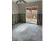 A Living Room featuring a sliding glass door to the outside at 1774 Michigan Ne Ave, St Petersburg, FL 33703