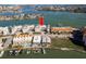 Aerial view showcasing this waterfront condo with a dock on a clear, sunny day at 188 Brightwater Dr # 2, Clearwater Beach, FL 33767