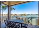 Enjoy outdoor dining with stunning waterfront views from this balcony at 188 Brightwater Dr # 2, Clearwater Beach, FL 33767