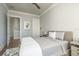 A comfortably styled bedroom featuring calm colors and a ceiling fan at 188 Brightwater Dr # 2, Clearwater Beach, FL 33767