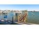 Private dock access and a boat lift, perfect for waterfront living and enjoying boating activities at 188 Brightwater Dr # 2, Clearwater Beach, FL 33767