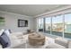 Inviting living room with water views and contemporary furnishings at 188 Brightwater Dr # 2, Clearwater Beach, FL 33767