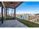 Relaxing patio with waterfront access and scenic views of the docks and waterways at 188 Brightwater Dr # 2, Clearwater Beach, FL 33767